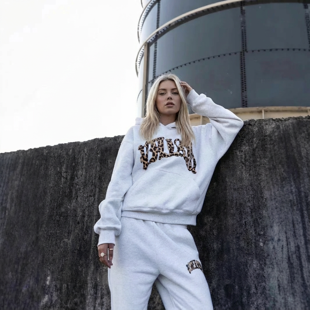 Women's leopard print hoodie and jogger set with hood and matching trousers