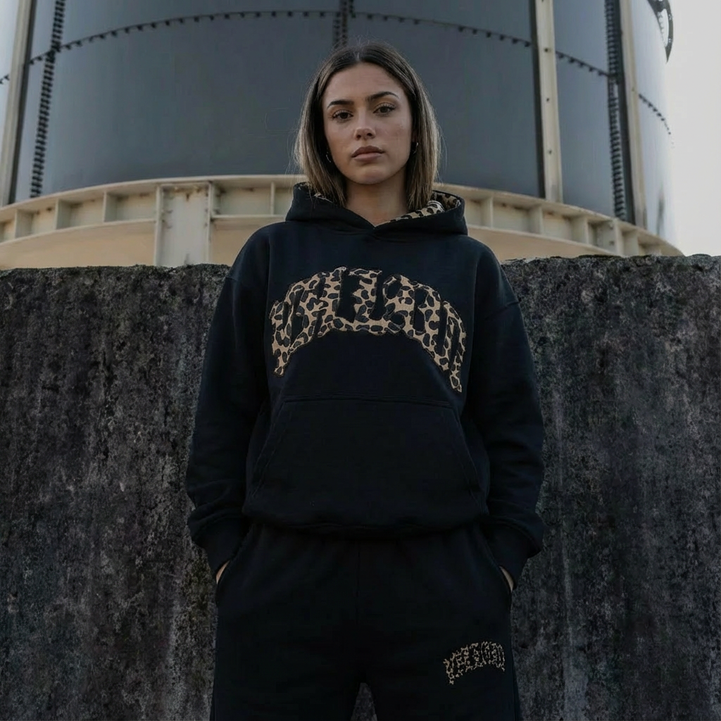 Women's leopard print hoodie and jogger set with hood and matching trousers