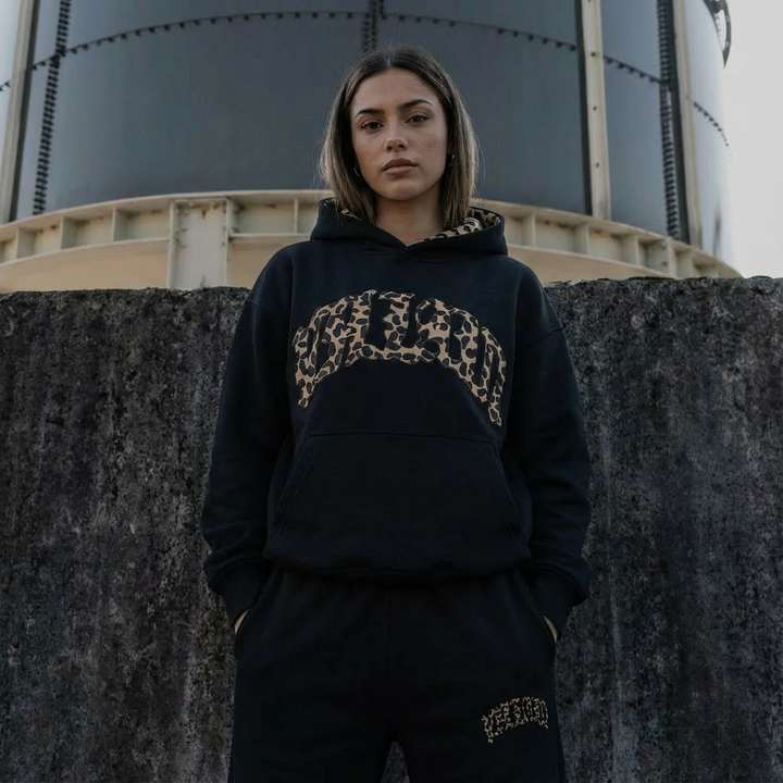 Women's leopard print hoodie and jogger set with hood and matching trousers