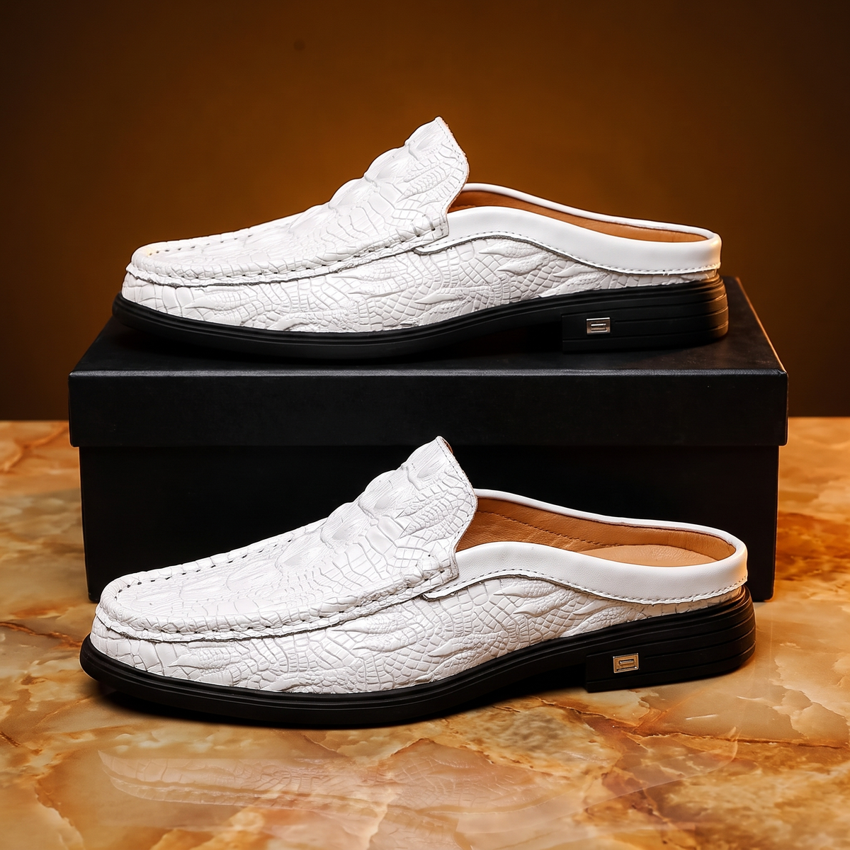 Men's crocodile-effect mule loafers with textured uppers and low layered soles