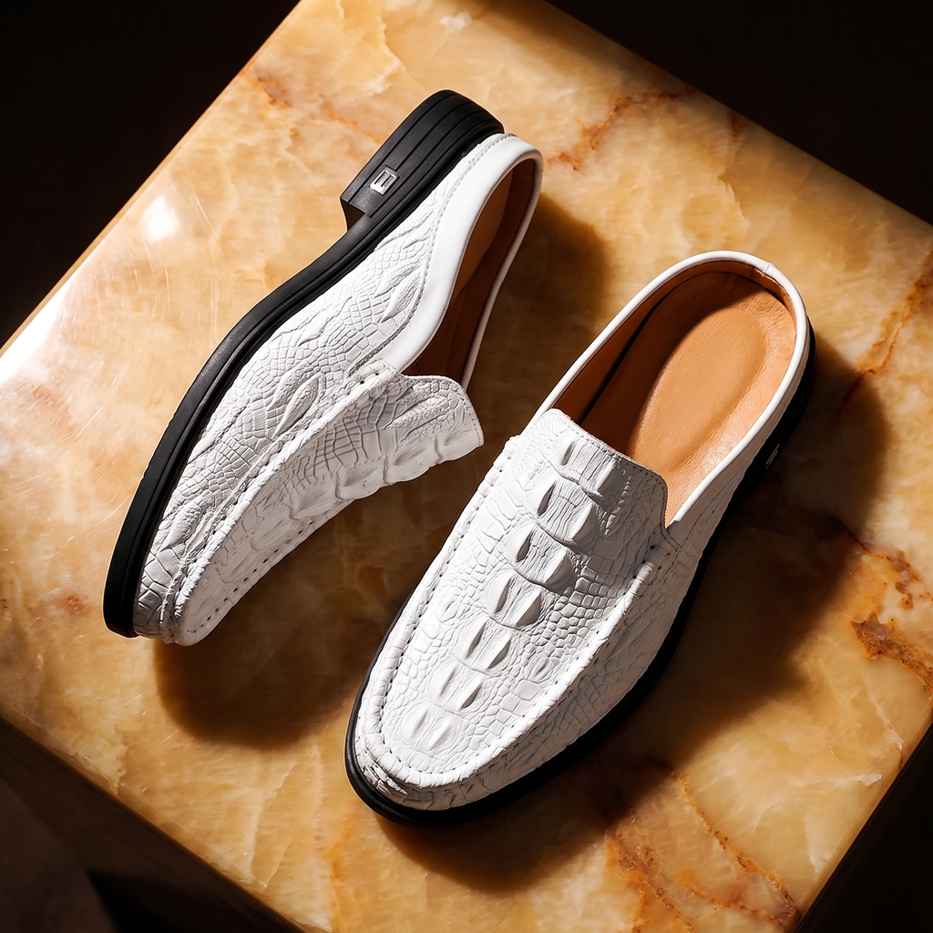 Men's crocodile-effect mule loafers with textured uppers and low layered soles