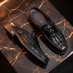 Men's crocodile-effect mule loafers with textured uppers and low layered soles