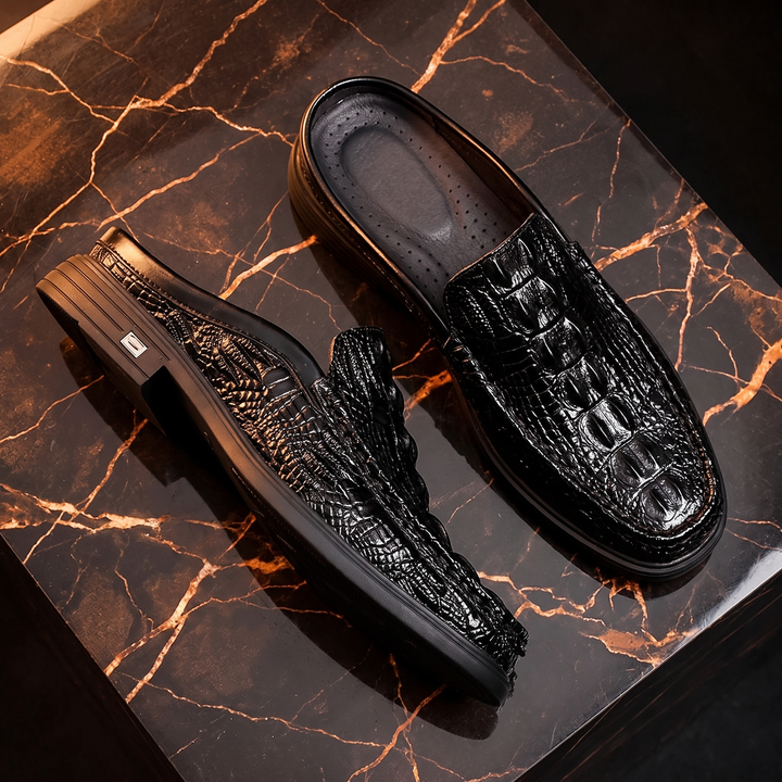 Men's crocodile-effect mule loafers with textured uppers and low layered soles