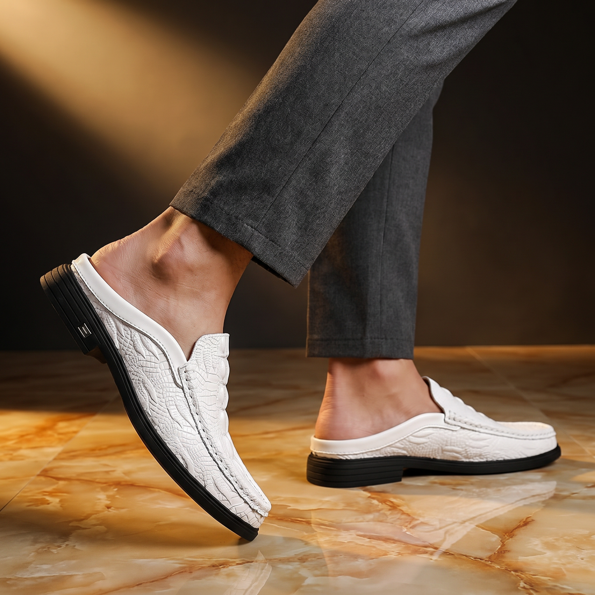 Men's crocodile-effect mule loafers with textured uppers and low layered soles