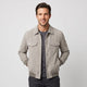 Men's trucker jacket with spread collar, snap front and utility pockets