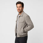 Men's trucker jacket with spread collar, snap front and utility pockets