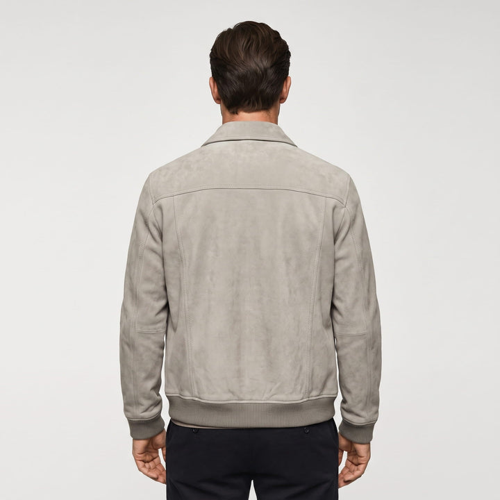 Men's trucker jacket with spread collar, snap front and utility pockets