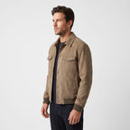 Men's trucker jacket with spread collar, snap front and utility pockets