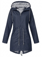Women's hooded longline rain coat with striped lining and zipped pockets