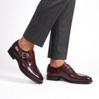 Crocodile-texture loafers with buckle straps and low heels