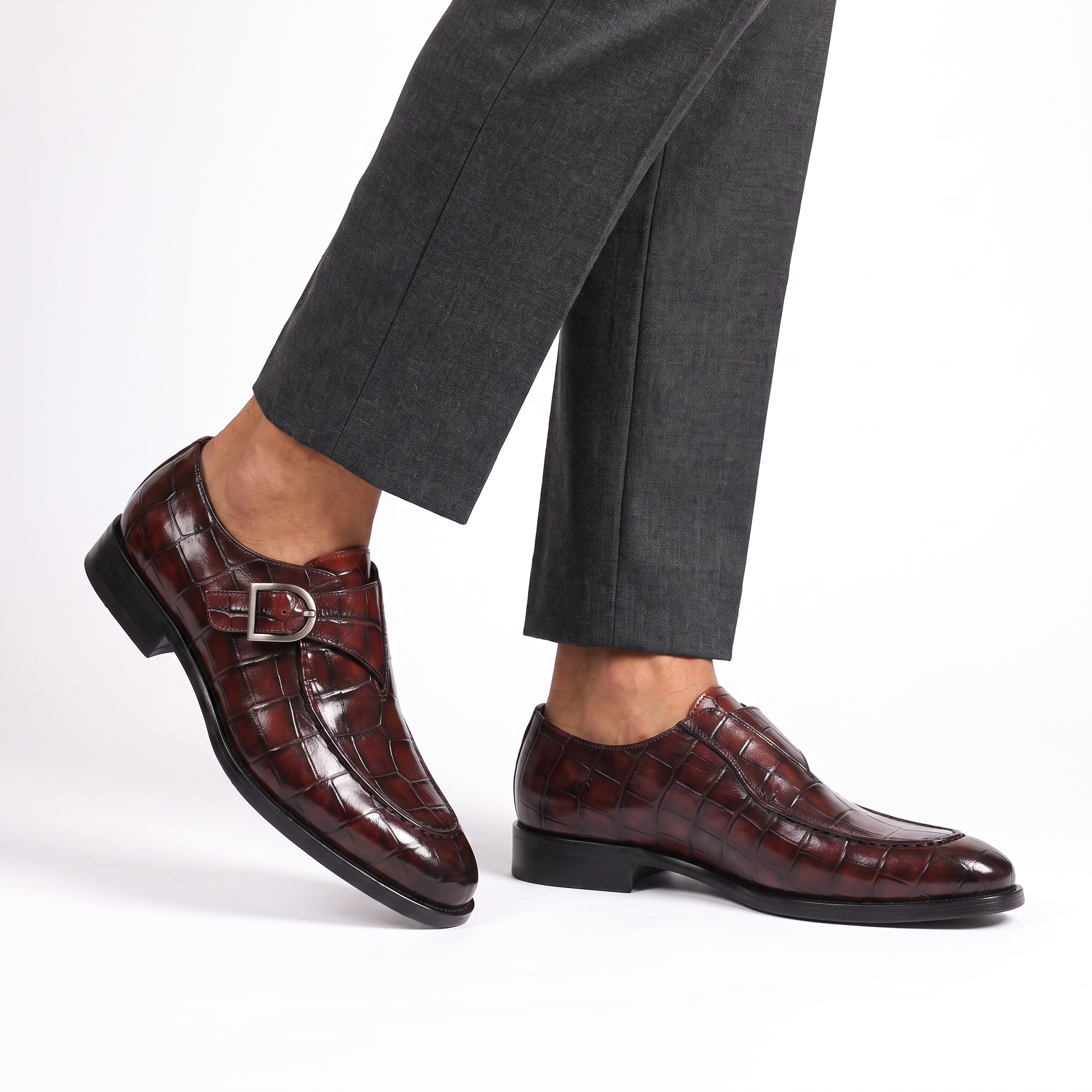 Crocodile-texture loafers with buckle straps and low heels