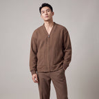 Men's textured knit cardigan with V-neck, zip front and patch pockets