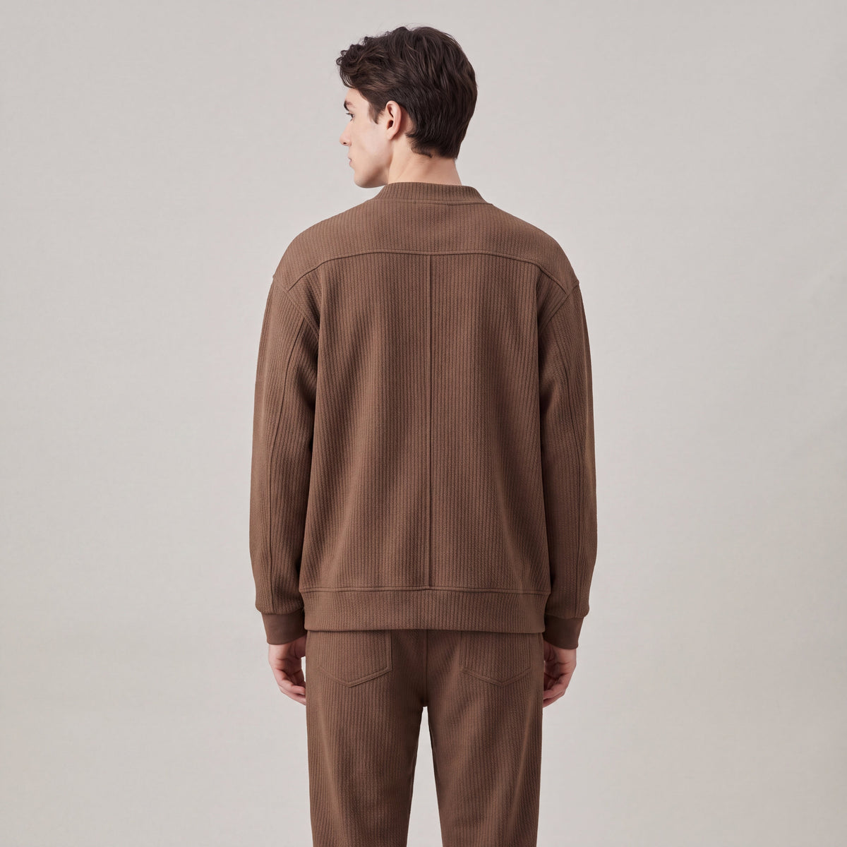 Men's textured knit cardigan with V-neck, zip front and patch pockets
