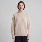 Women's long-sleeve turtleneck sweater with ribbed trims