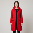 Women's long belted double-breasted trench coat with raised collar and cuff straps