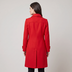 Women's long belted double-breasted trench coat with raised collar and cuff straps