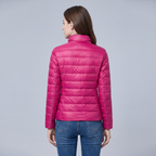 Women's quilted puffer jacket with high collar, long sleeves and front zip
