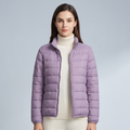 Women's quilted puffer jacket with high collar and long sleeves