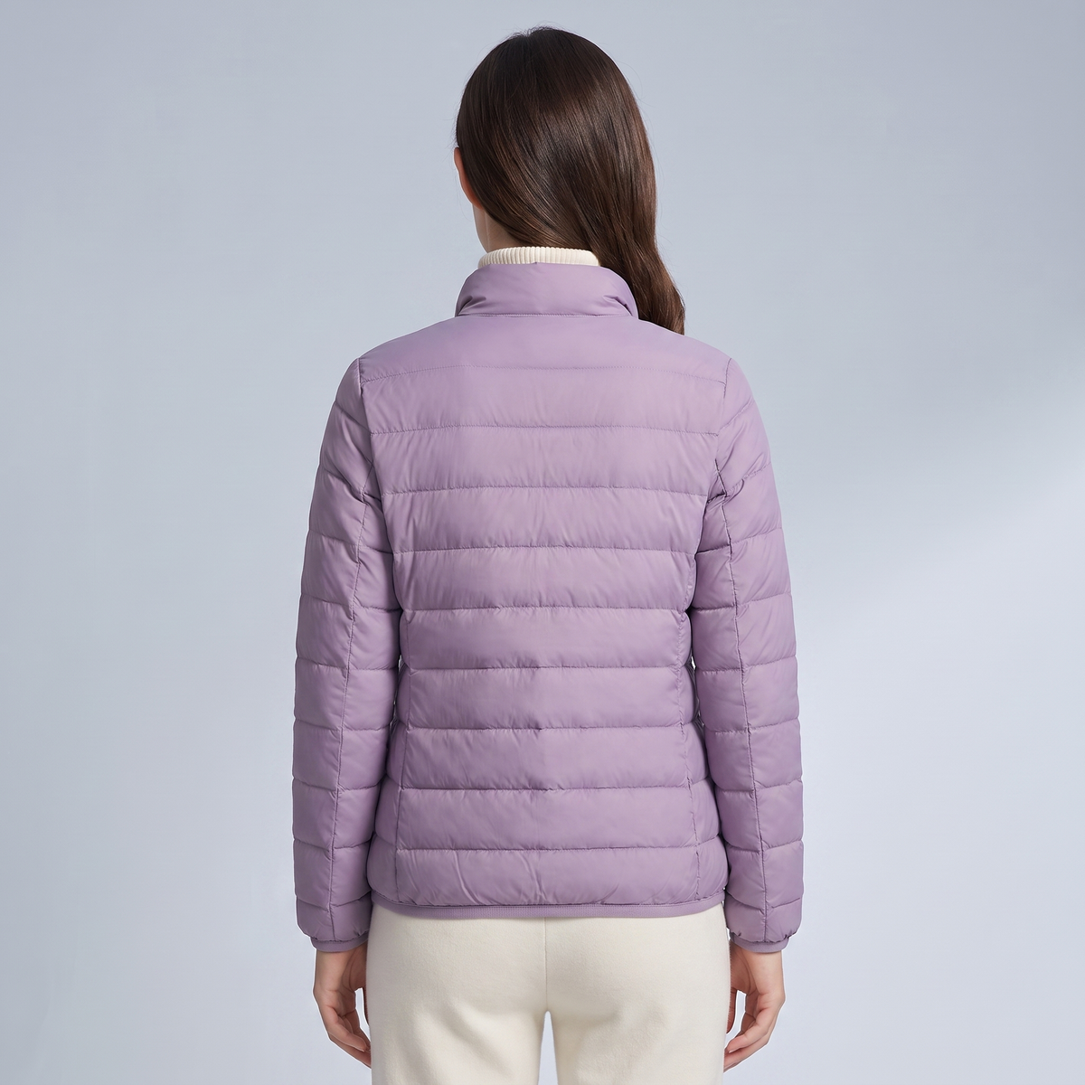 Women's quilted puffer jacket with high collar and long sleeves