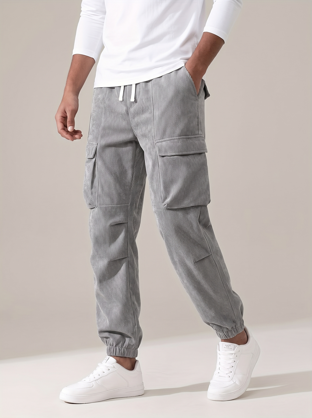 Men's corduroy cargo trousers in smoky silver with drawstring waist and cuffed hems