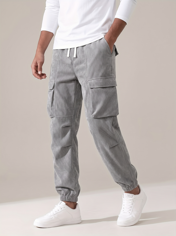 Men's corduroy cargo trousers in smoky silver with drawstring waist and cuffed hems