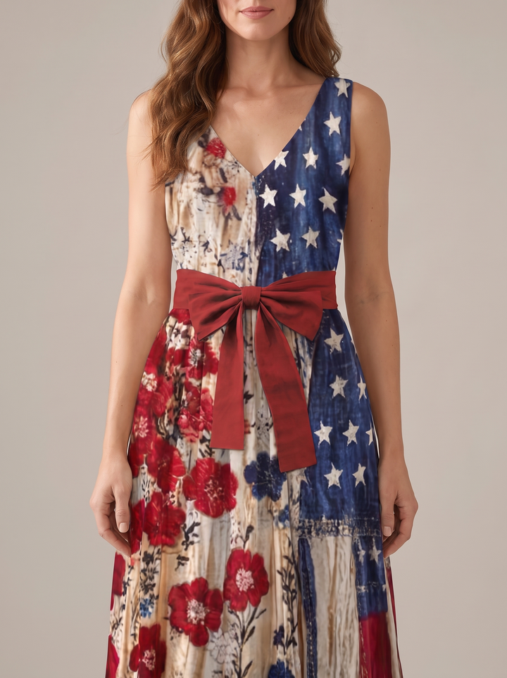 Close-up of the V-neck bodice and red waist bow
