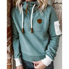 Women's hooded half-zip sweatshirt with long sleeves and utility sleeve pocket