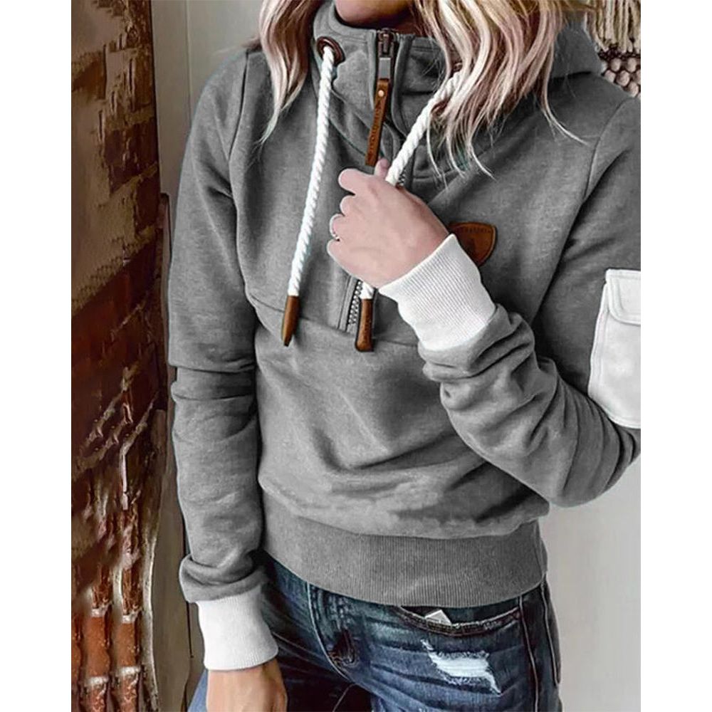 Women's hooded half-zip sweatshirt with long sleeves and utility sleeve pocket