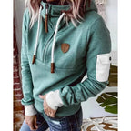 Women's hooded half-zip sweatshirt with long sleeves and utility sleeve pocket