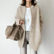 Women's long button cardigan with round neckline and long sleeves