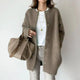 Women's long button cardigan with round neckline and long sleeves