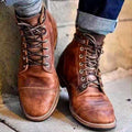Men's lace-up ankle boots with rounded toes and stitched panel detailing