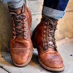 Men's lace-up ankle boots with rounded toes and stitched panel detailing
