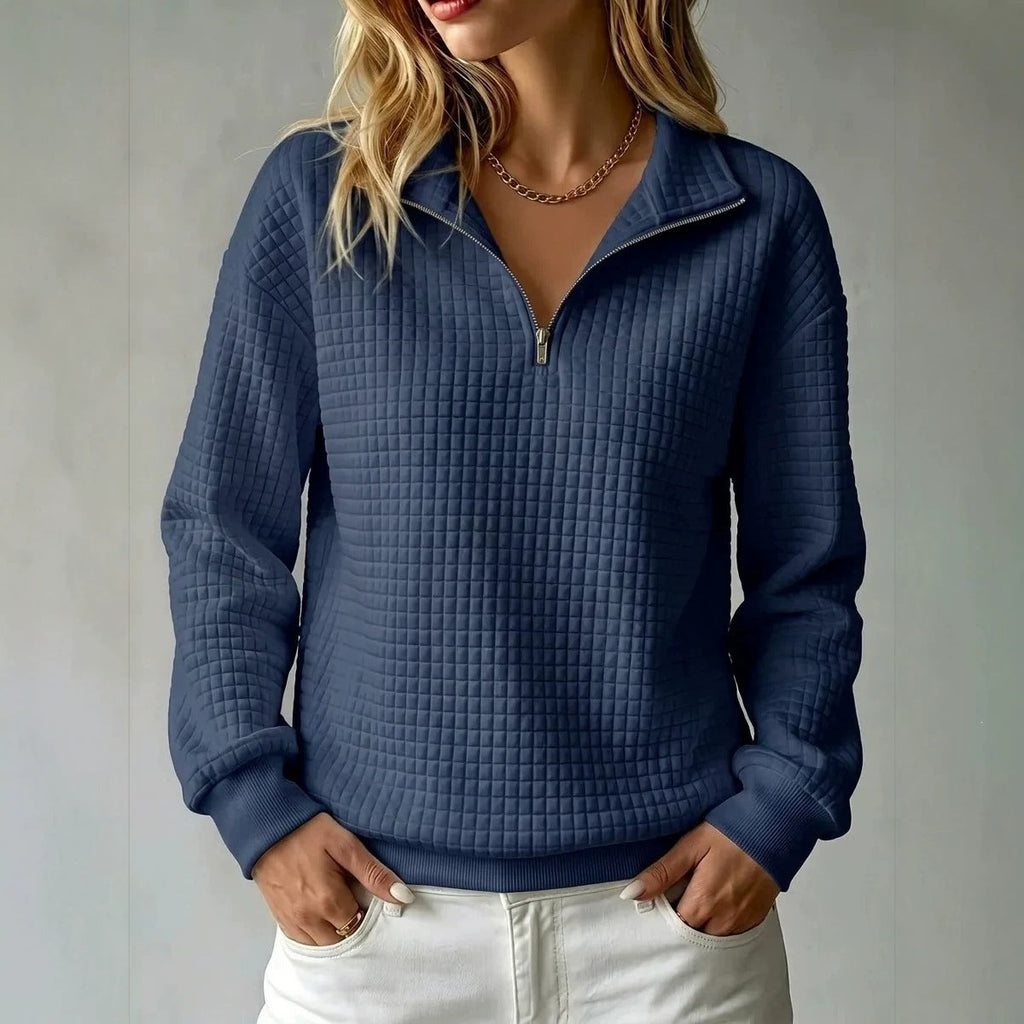 Women's quilted half-zip sweatshirt with high collar and long sleeves