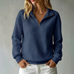 Women's quilted half-zip sweatshirt with high collar and long sleeves