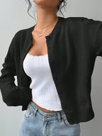 Women's slim fit knitted cardigan with long sleeves and button front