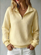 Women's quilted half-zip sweatshirt with high collar and long sleeves