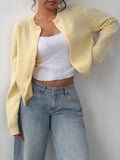 Women's slim fit knitted cardigan with long sleeves and button front