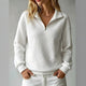 Women's quilted half-zip sweatshirt with high collar and long sleeves