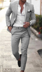 Men's textured two-piece suit with notch-lapel blazer and tapered trousers