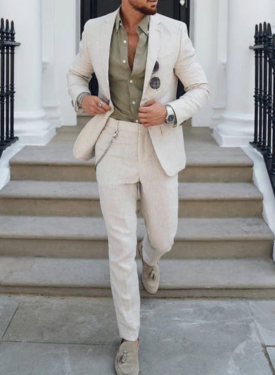 Men's textured two-piece suit with notch-lapel blazer and tapered trousers