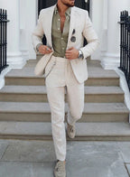 Men's textured two-piece suit with notch-lapel blazer and tapered trousers