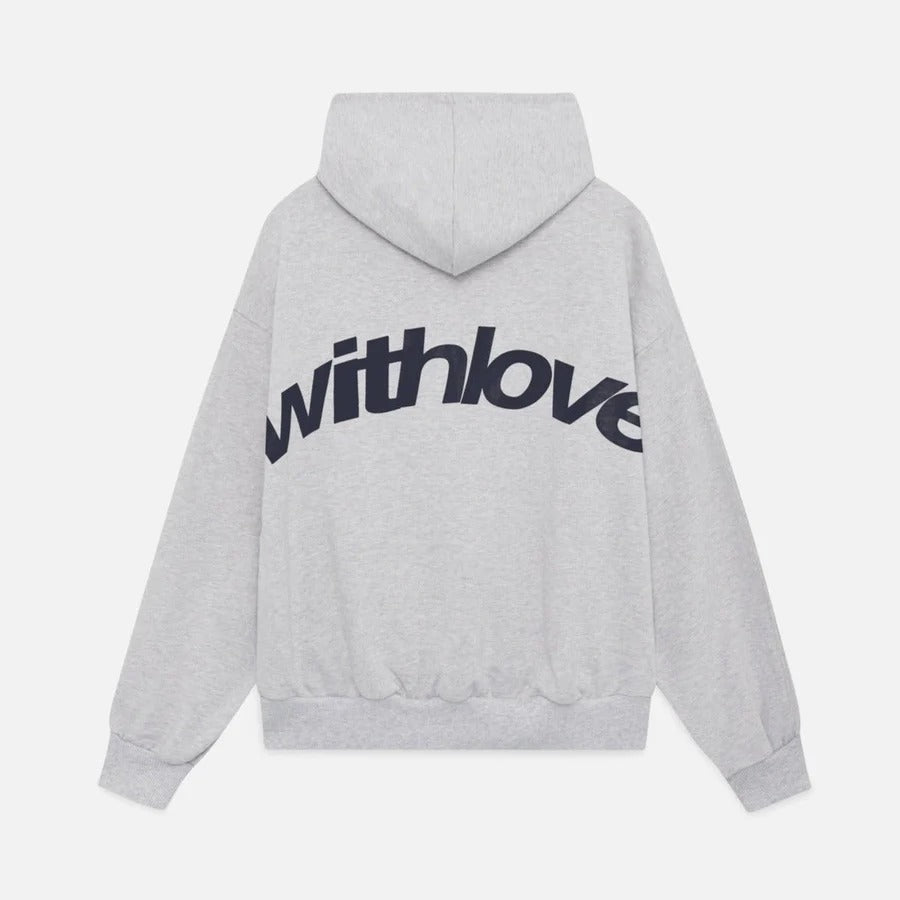 Oversized pullover hoodie with hood, long sleeves and contrasting text graphic on the back