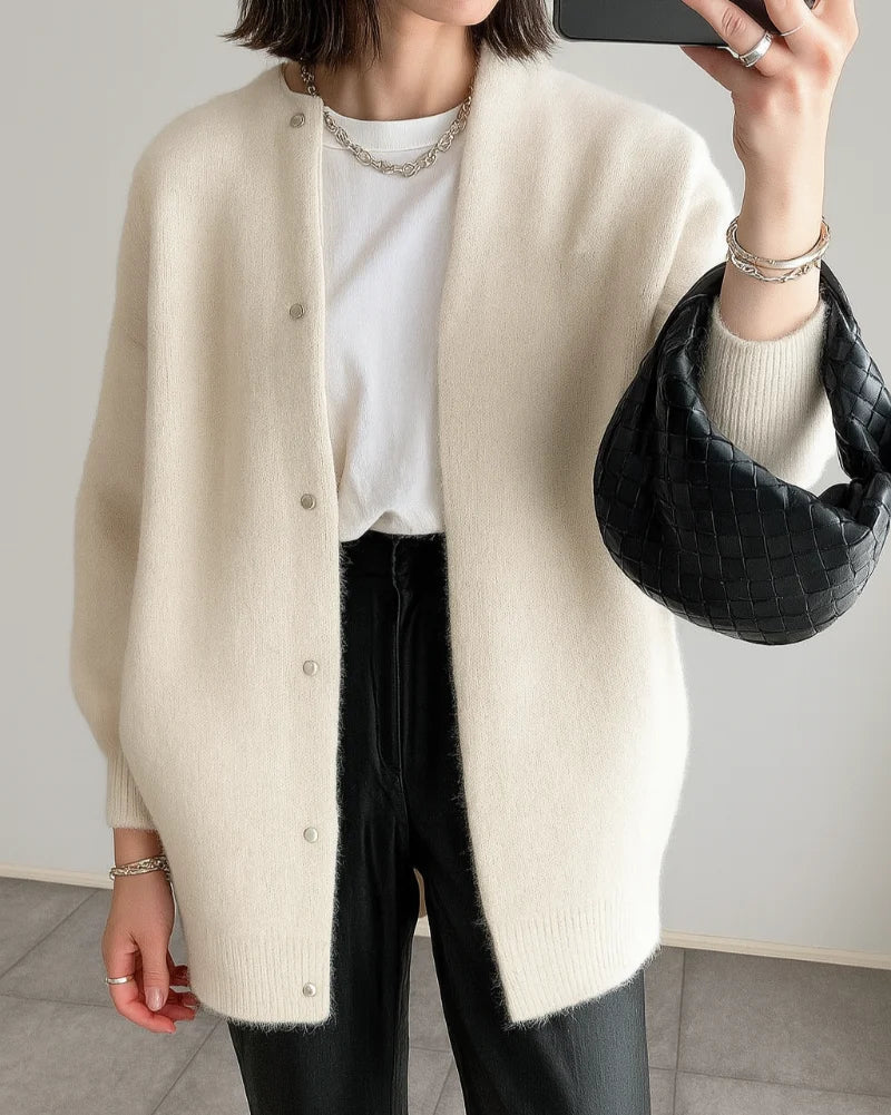 Women's longline button cardigan with round neckline and long sleeves