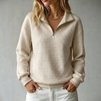 Women's quilted half-zip sweatshirt with high collar and long sleeves