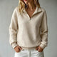Women's quilted half-zip sweatshirt with high collar and long sleeves