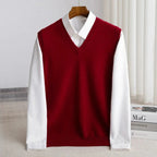Men's V-neck knitted sweater vest layered over a white shirt