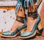 Women's ankle boots with three buckle straps and block heel