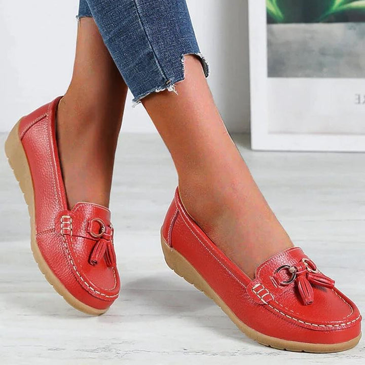 Women's loafers with tassels and metal bit details