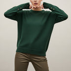 Women's long sleeve crew neck sweater with button details